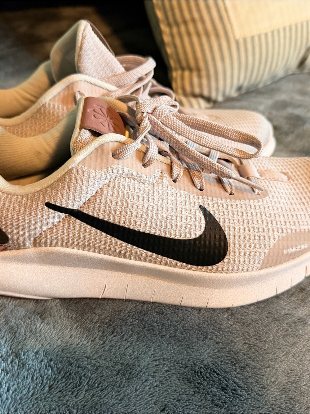 Nike Women's Pale Pink Sneakers with Black Swoosh